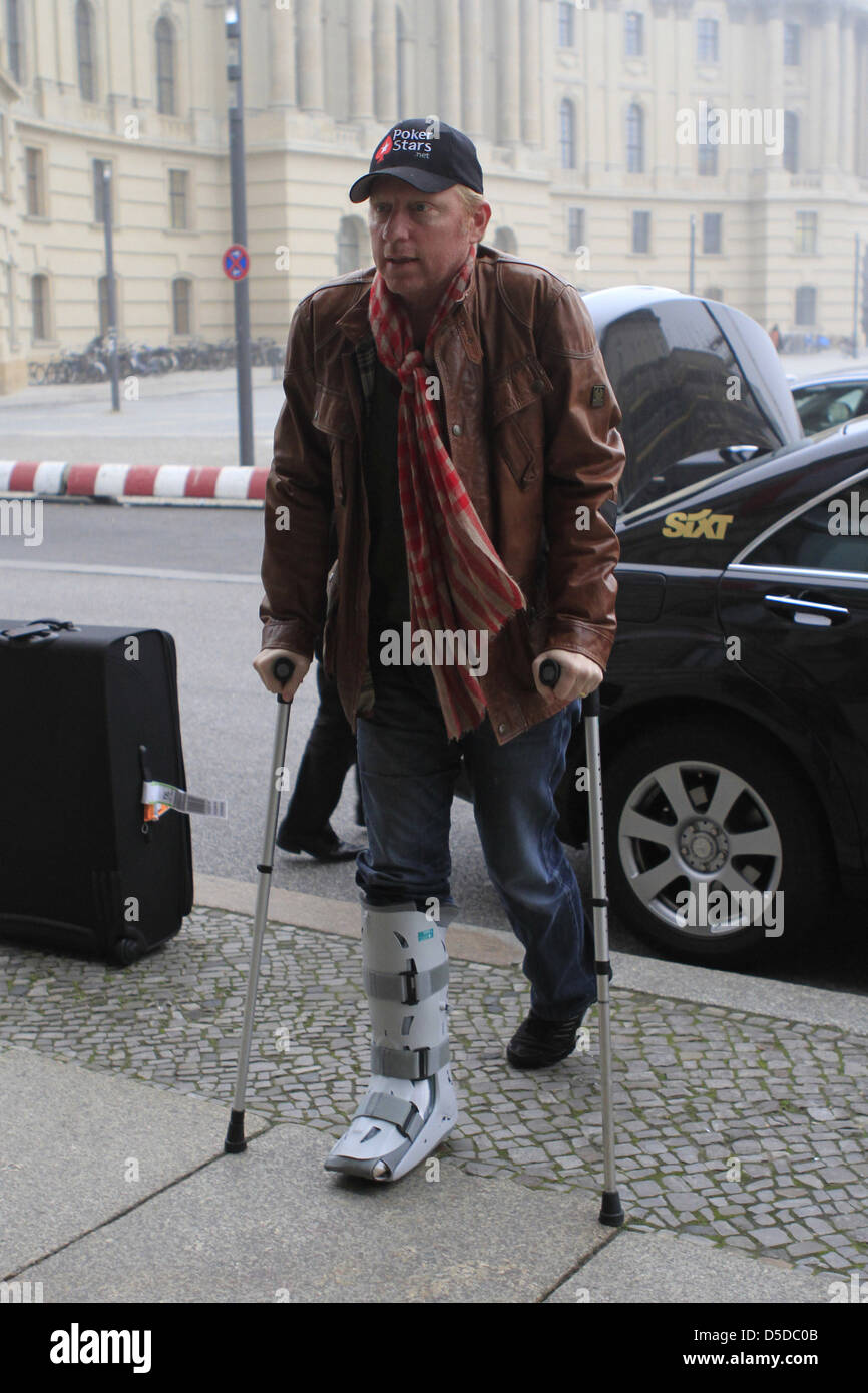 Boris Becker arriving on crutches at Hotel de Rome. Berlin, Germany Stock Photo