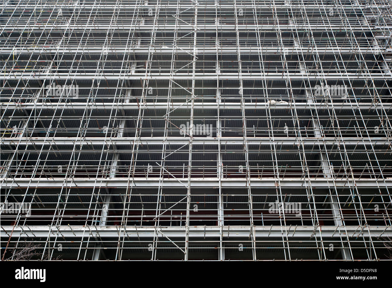 London, United Kingdom, scaffolding on a building in the business center of Canary Wharf in the Docklands Stock Photo