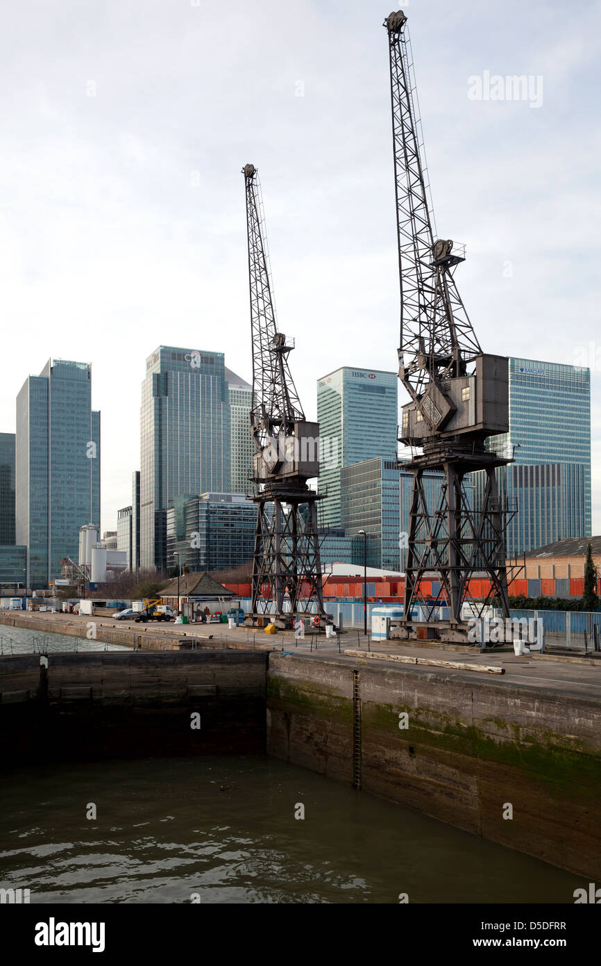 London, United Kingdom, old harbor area of Docklands with the skyscrapers in the business hub of Canary Wharf Stock Photo