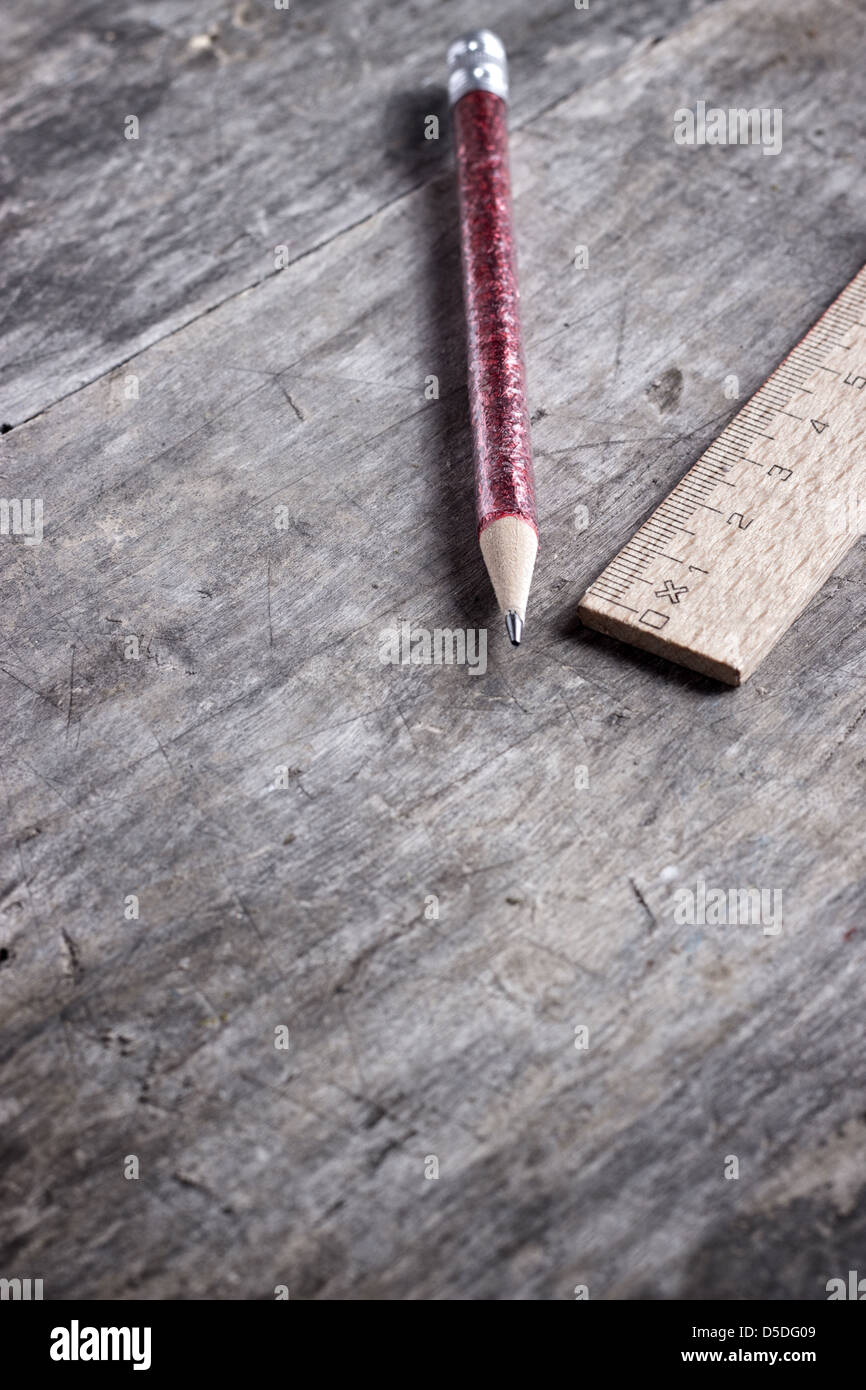 wooden ruler and pen on wooden table Stock Photo