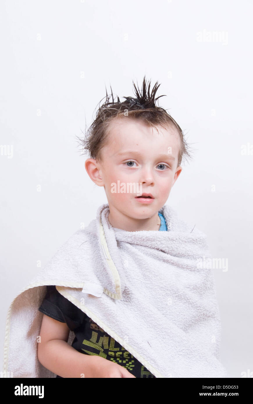 Young Boy With Wet Hair Sticking Up In A Comedy Mohican Style