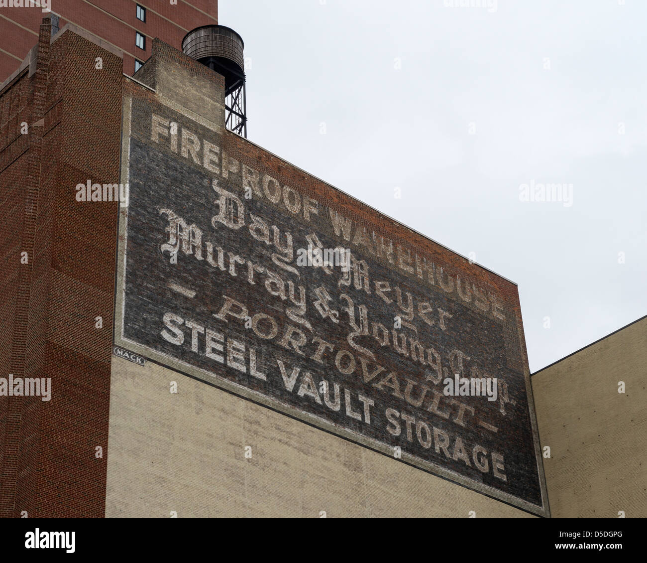 Sign on Day & Meyer, Murray & Young Corp packing, shipping and storage building (1927), New York.  Painted by Harry Middleton. Stock Photo