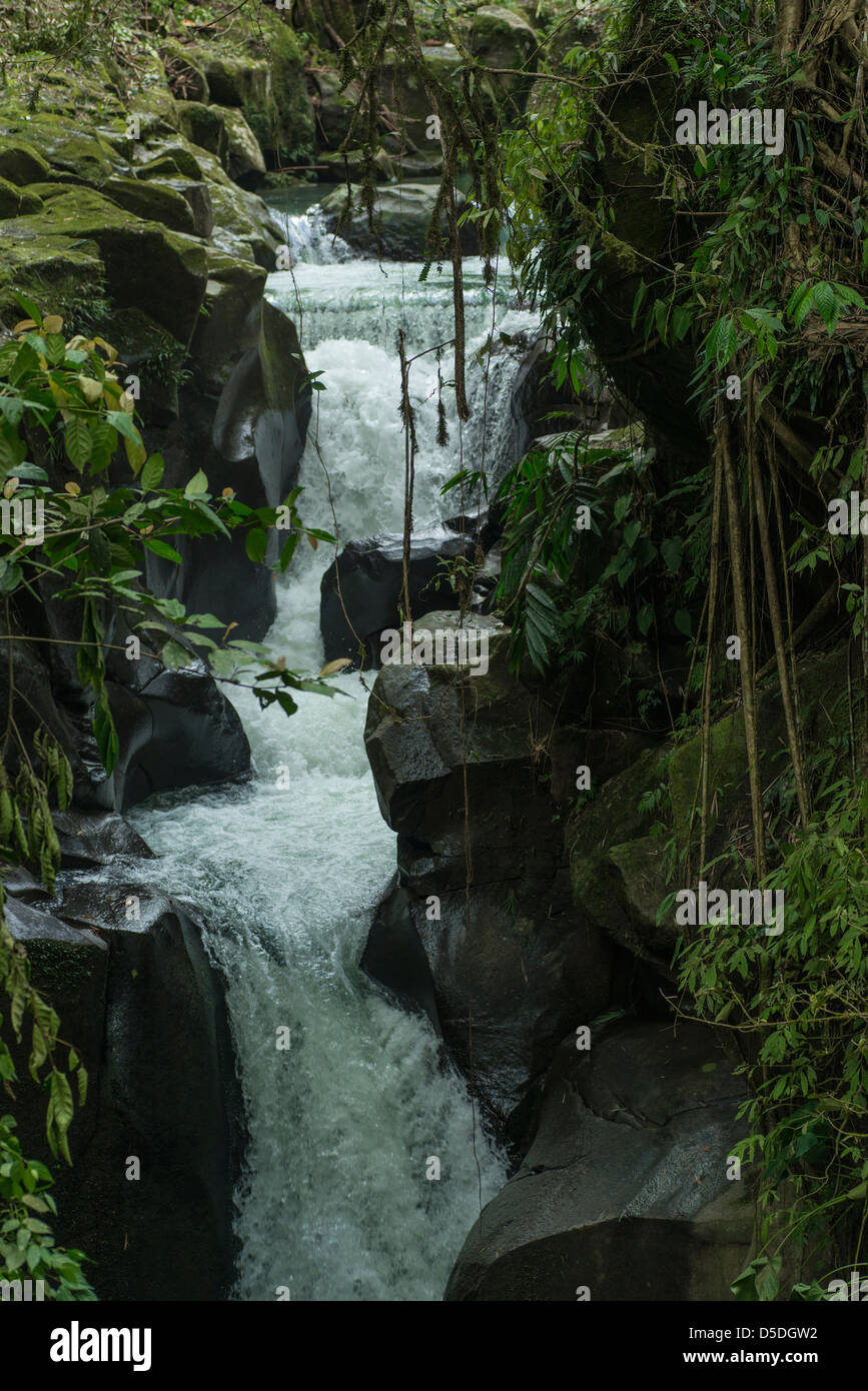 River running through a rocky area with waterfalls Stock Photo - Alamy