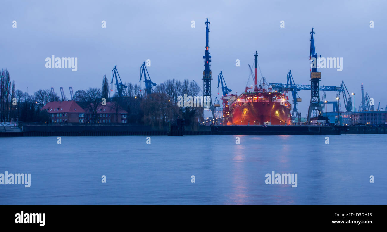 Hamburg city dock works at the evening Stock Photo