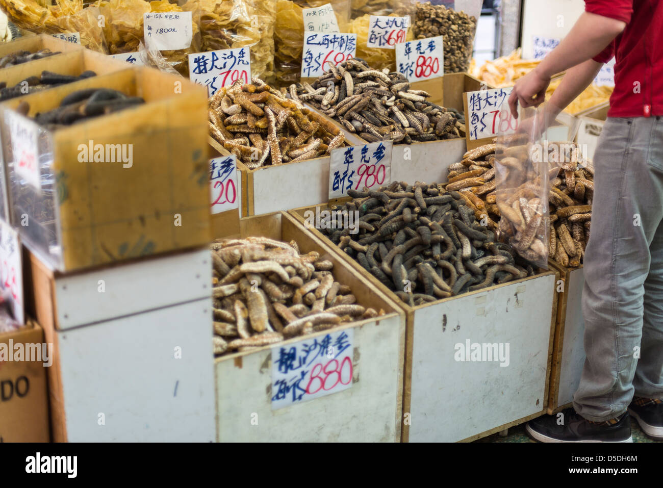 Dried food stalled in the entrance of a store in Hong Kong Stock Photo