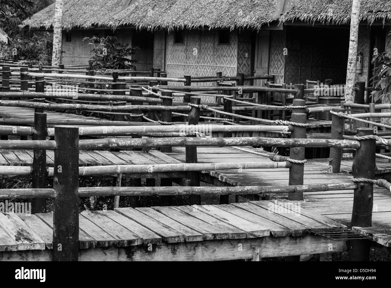 Elaborate structure of fences with huts in the background Stock Photo