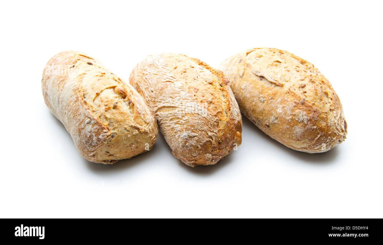 wholemeal bread rolls isolated on white background Stock Photo