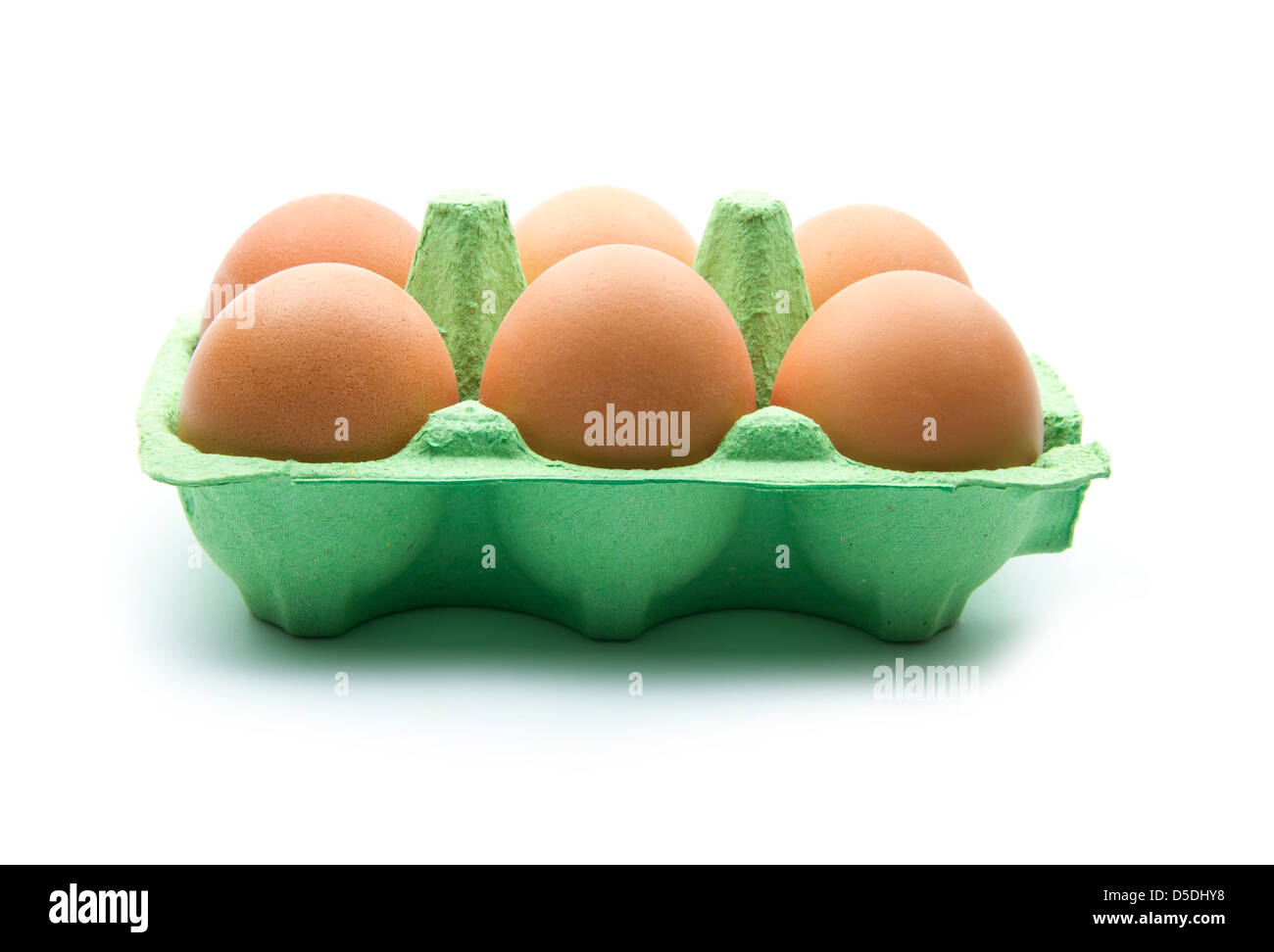 eggs in green box isolated on white background Stock Photo