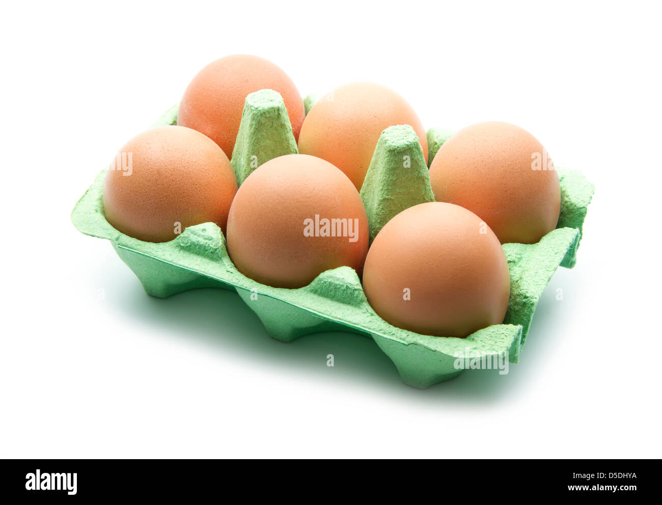 eggs in green box isolated on white background Stock Photo