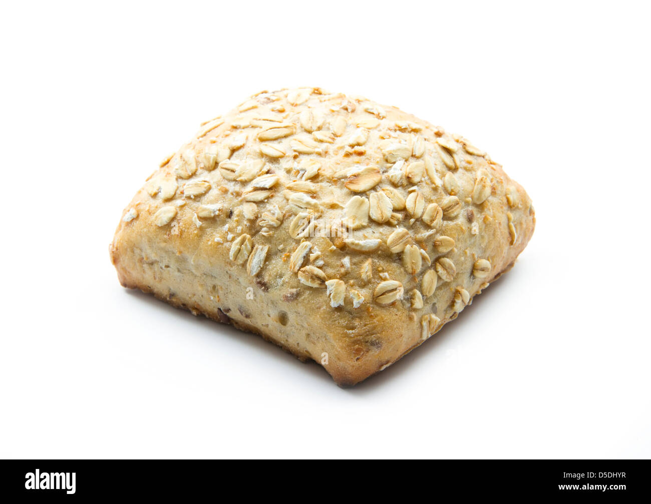 wholemeal roll with oats isolated on white background Stock Photo
