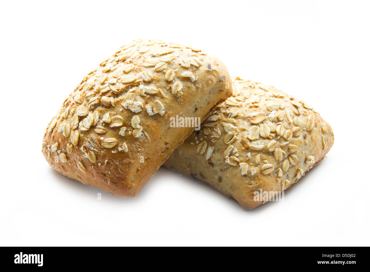 wholemeal bread rolls isolated on white background Stock Photo
