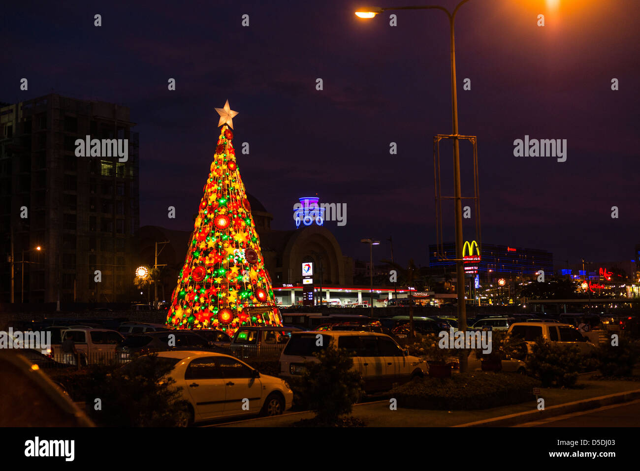 Colorful and brightly lit christmas tree outside Manila airport Stock Photo