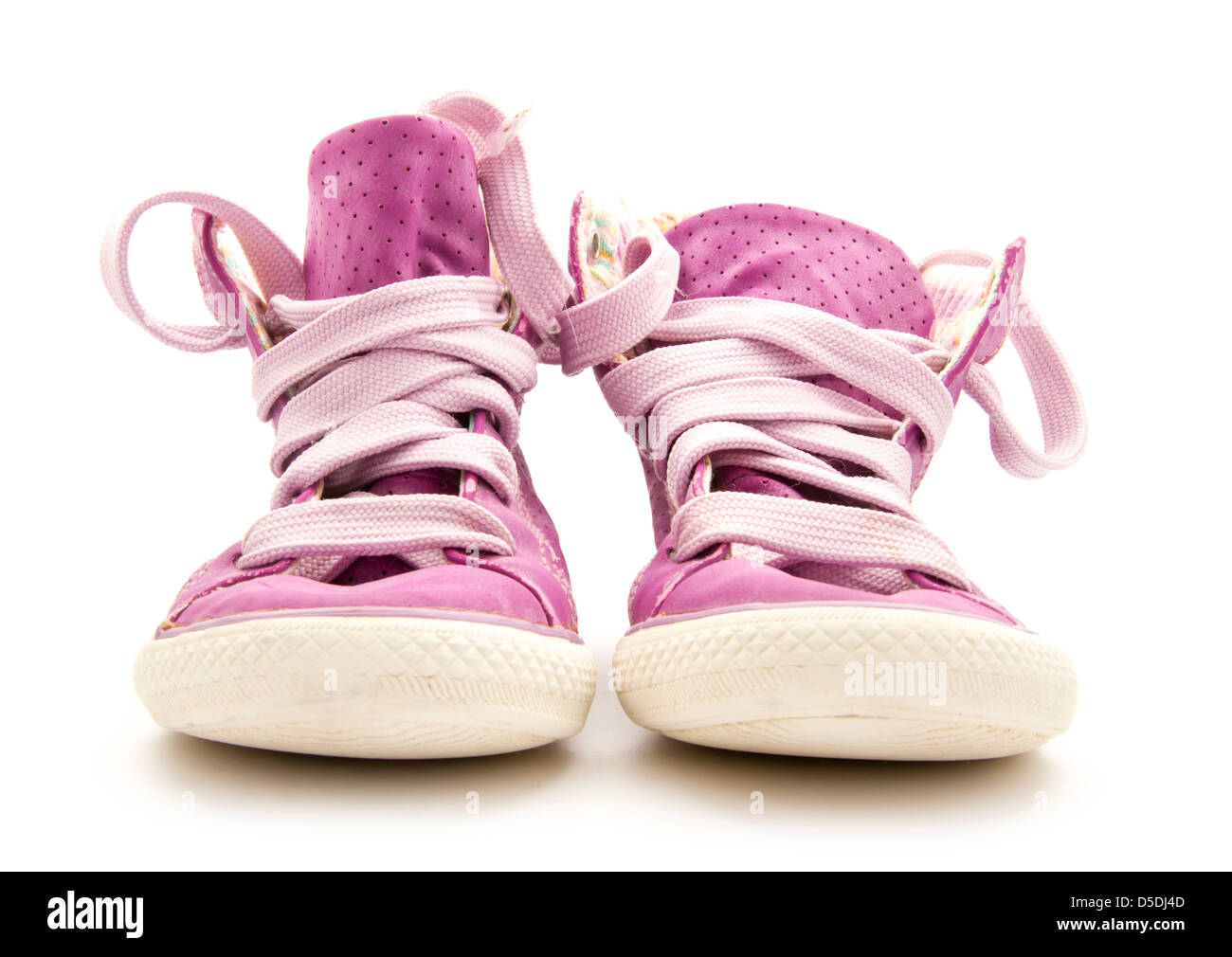 pair of purple sneakers isolated on white background Stock Photo - Alamy