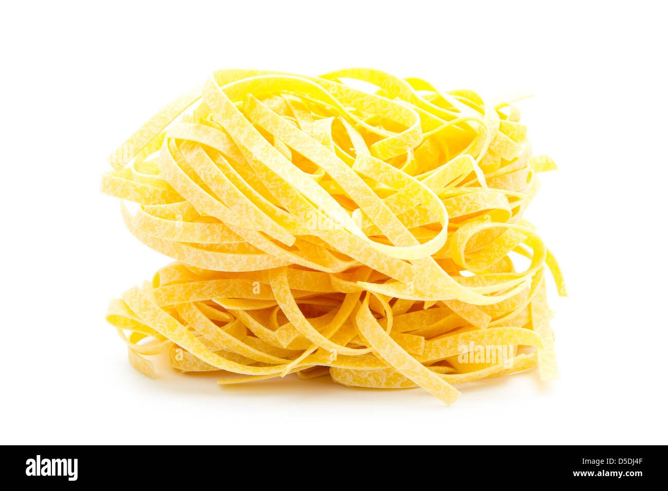 italian pasta tagliatelle isolated on white background Stock Photo