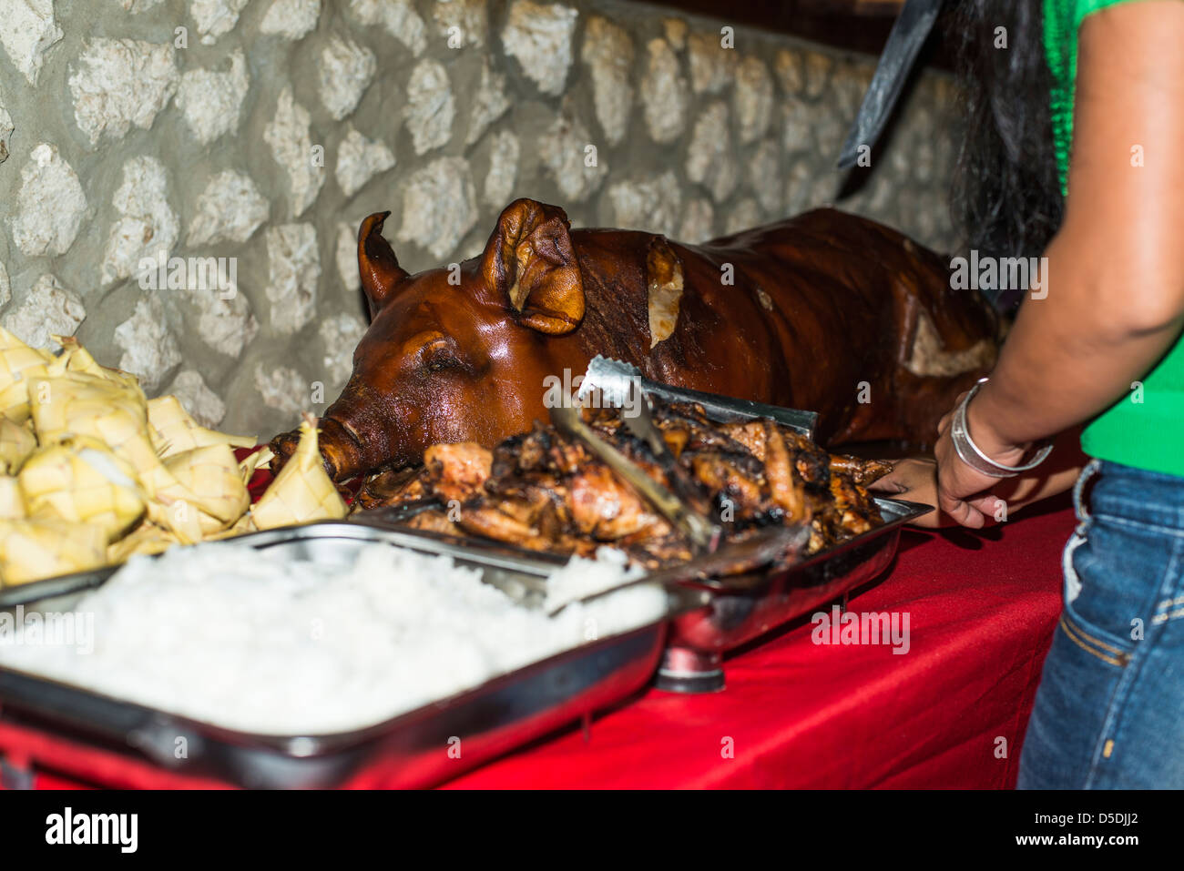 Christmas dinner with a whole roasted pig Stock Photo