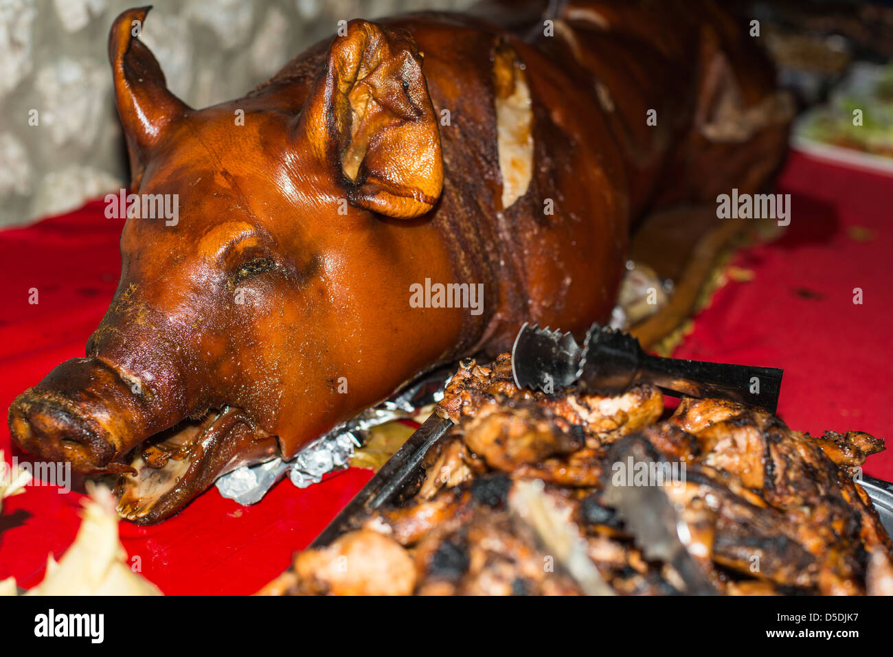 Christmas dinner with a whole roasted pig Stock Photo Alamy