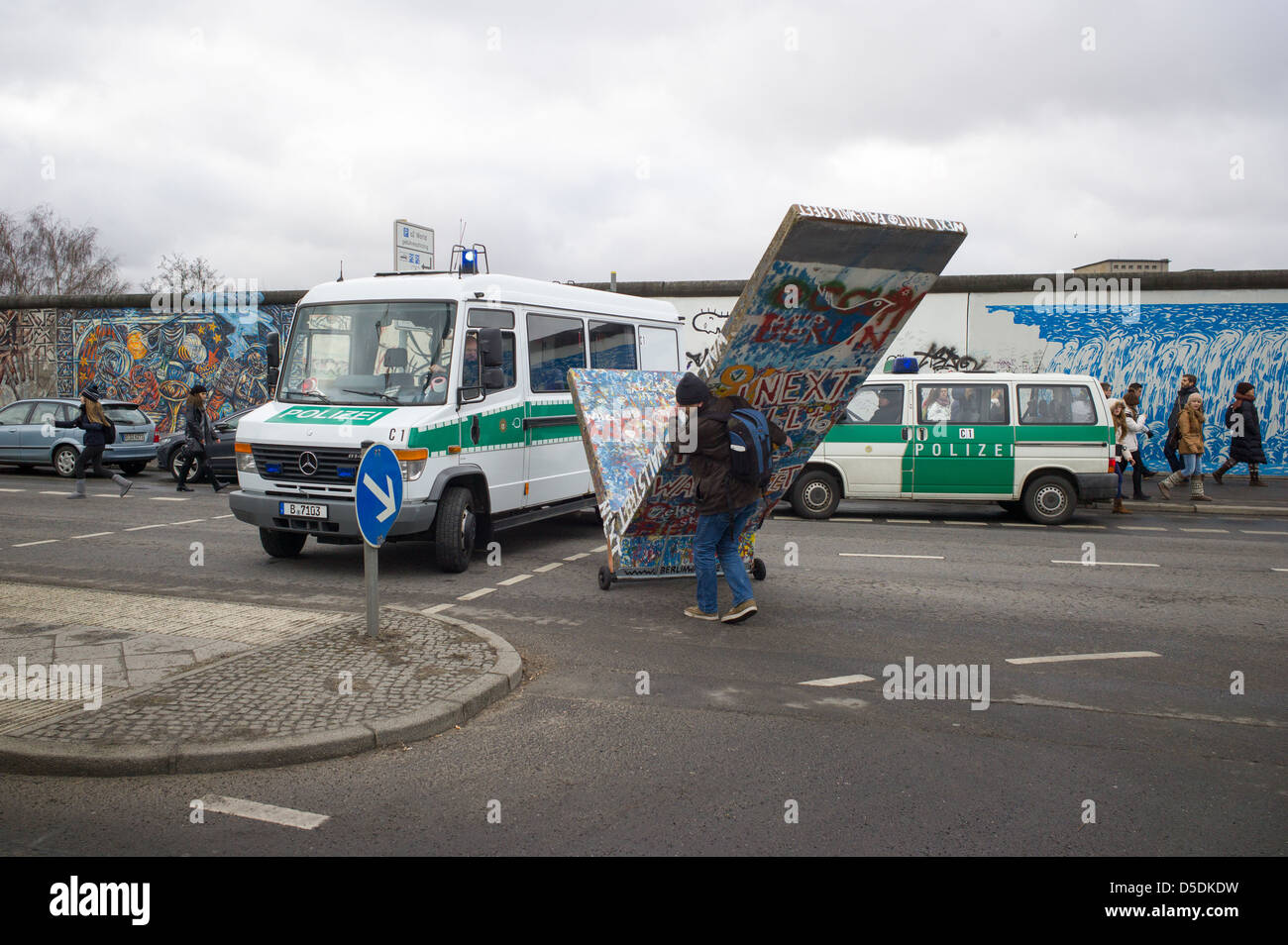Berlin, Germany, demonstrators with a wall segment papier-mâché Stock Photo
