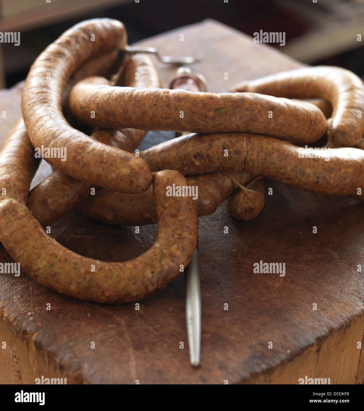 a close up at sausages on a butcher's counter Stock Photo