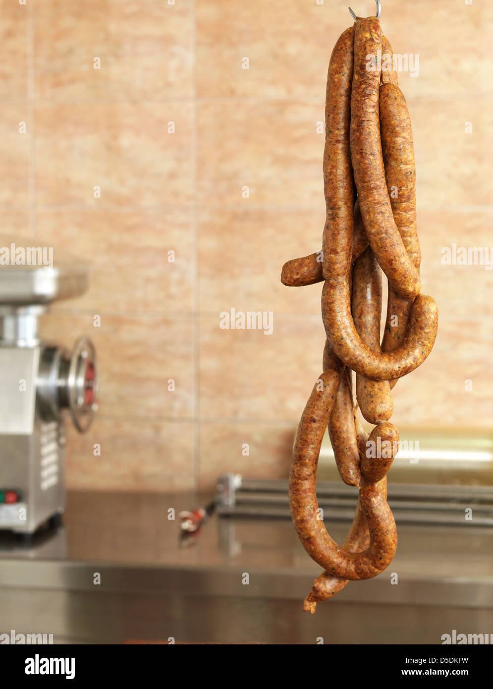sausages hanging in a butchery Stock Photo