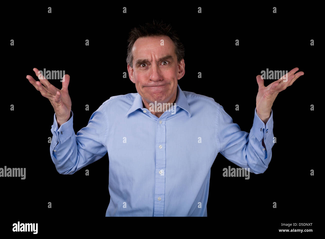 Angry Middle Age Business Man Hands Raised in Frustration Black Background Stock Photo
