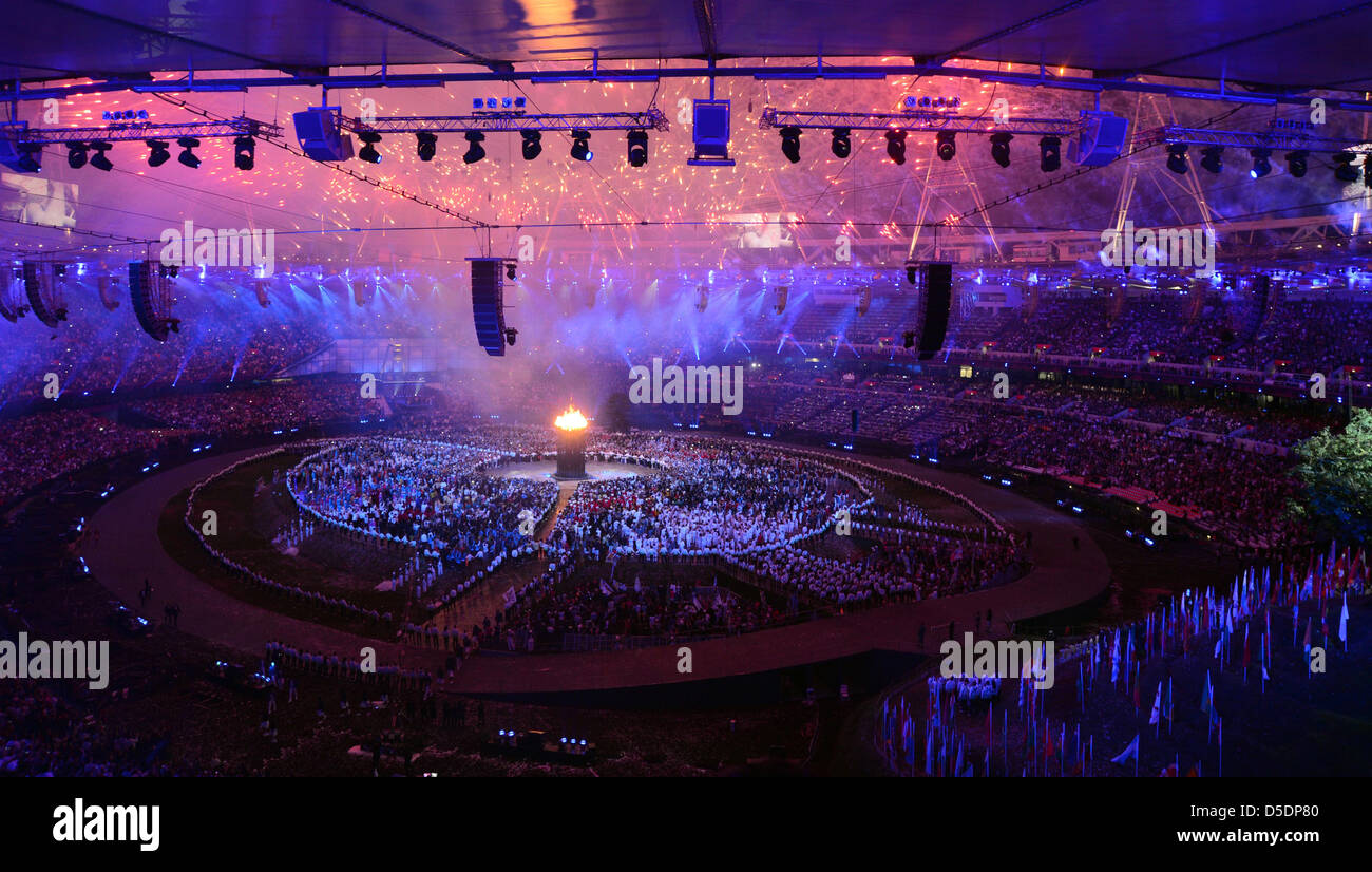 Fireworks explode as the Cauldron is lit Stock Photo - Alamy