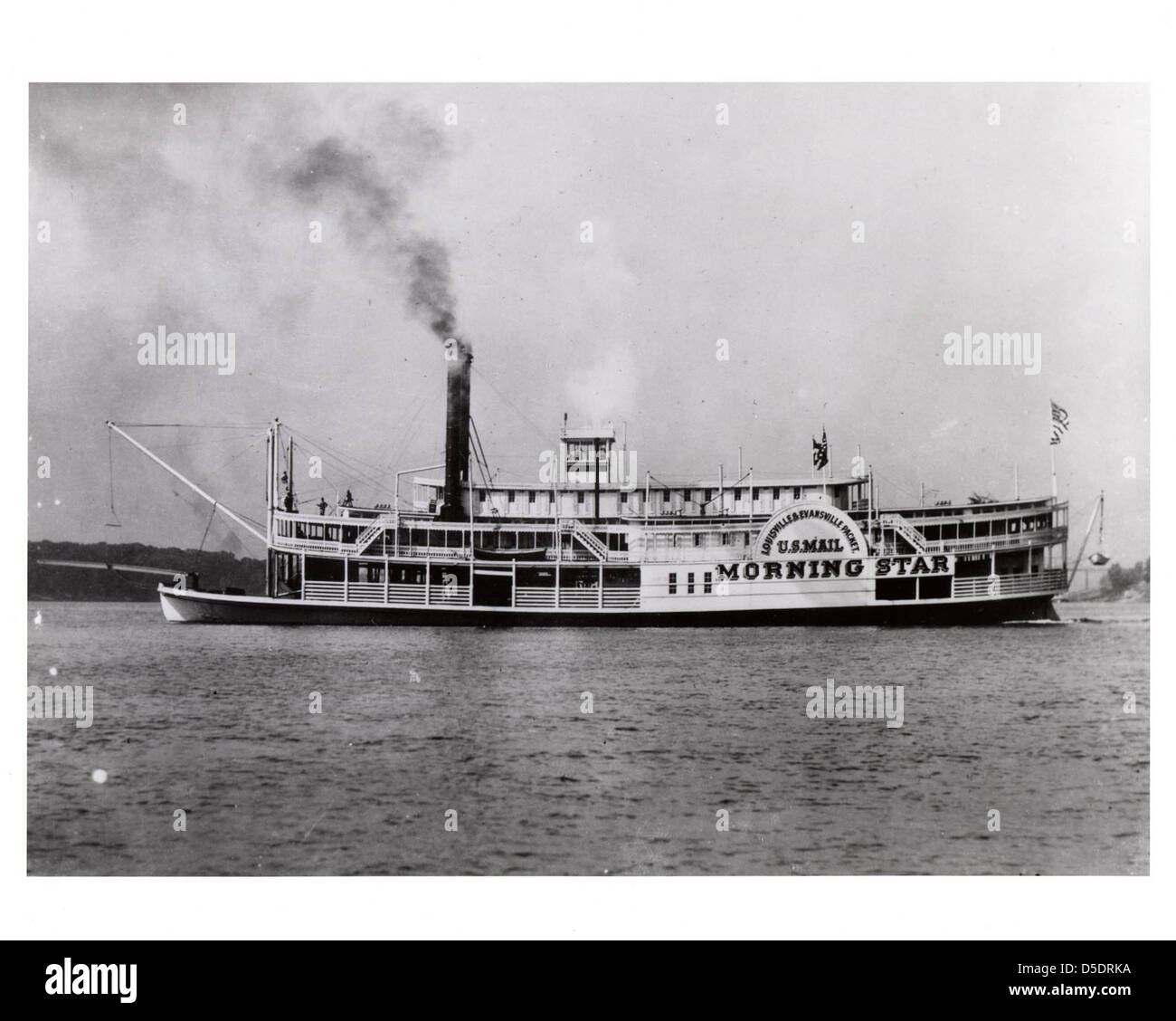 The Steamboat Morning Star, a riverboat used for mail delivery, is depicted in this image. This type of steamboat was essential for communication and transportation across waterways in the late 19th and early 20th centuries. Stock Photo
