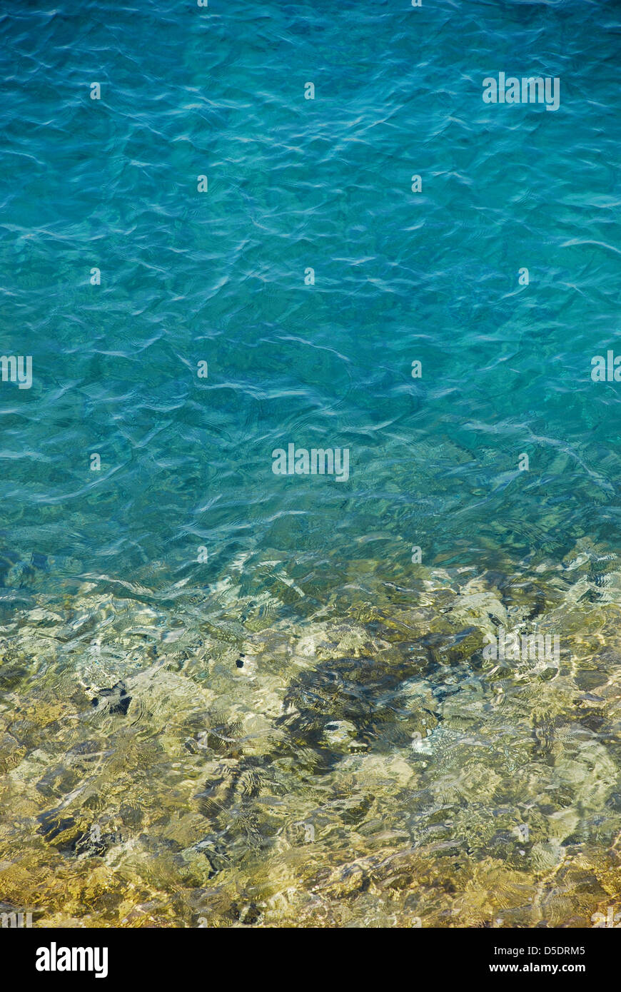 Gentle waves on reflecting water surface hi-res stock photography and ...