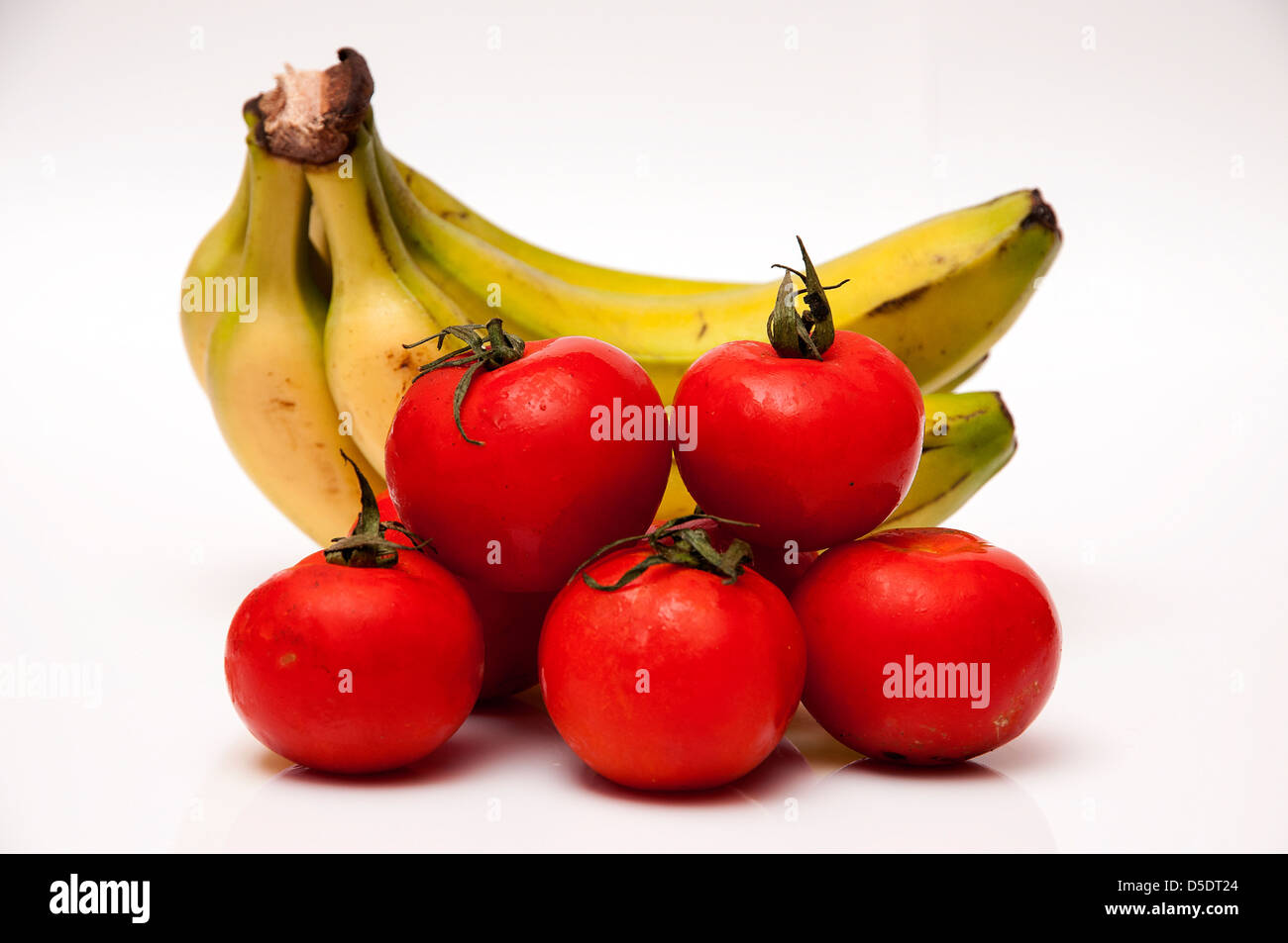 assorted fruit with bananas and tomatoes Stock Photo Alamy