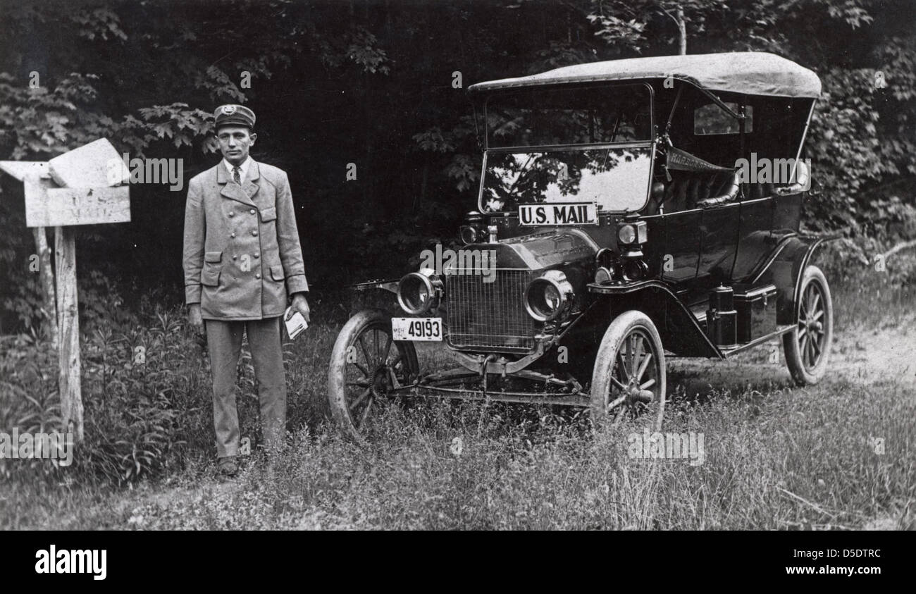 Uniformed Rural Letter Carrier and Vehicle Stock Photo Alamy
