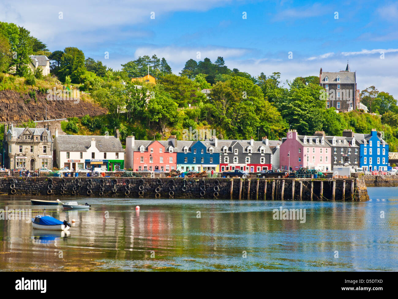 Isle of Mull Tobermory harbour at high tide with small fishing boats