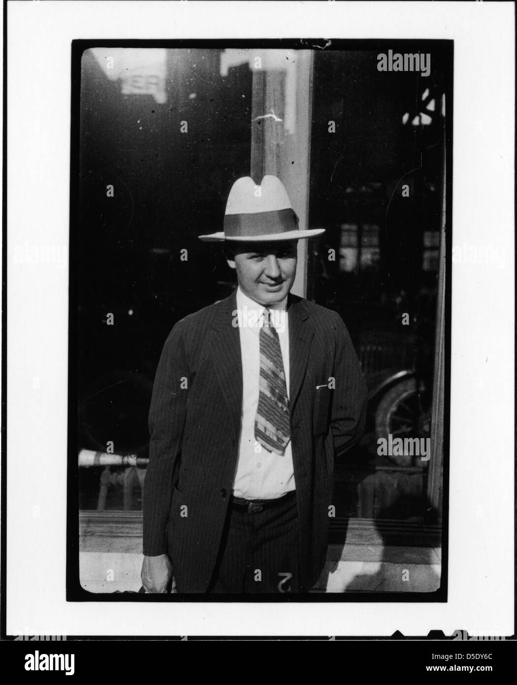 Tennessee v. John T. Scopes Trial: Unidentified man in front of auto dealership, Dayton, Tennessee. Stock Photo