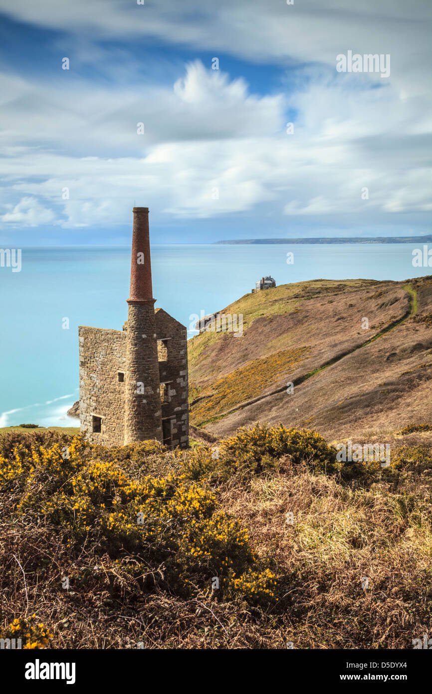 Rinsey Head and Engine House on the south coast of Cornwall, captured using a long shutter speed to blur the sea and clouds Stock Photo