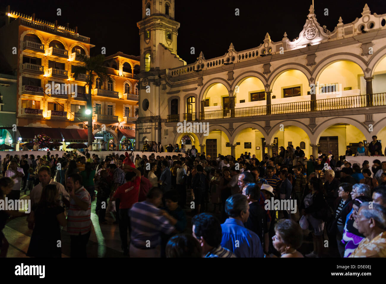 Night view of crowd in Los Portales at Carnival, Veracruz, Mexico Stock Photo
