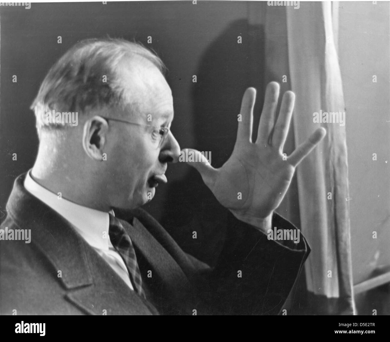 Frank Thone, a man known for his humorous persona, is pictured with a comical expression and glasses, reflecting his distinctive character. Stock Photo