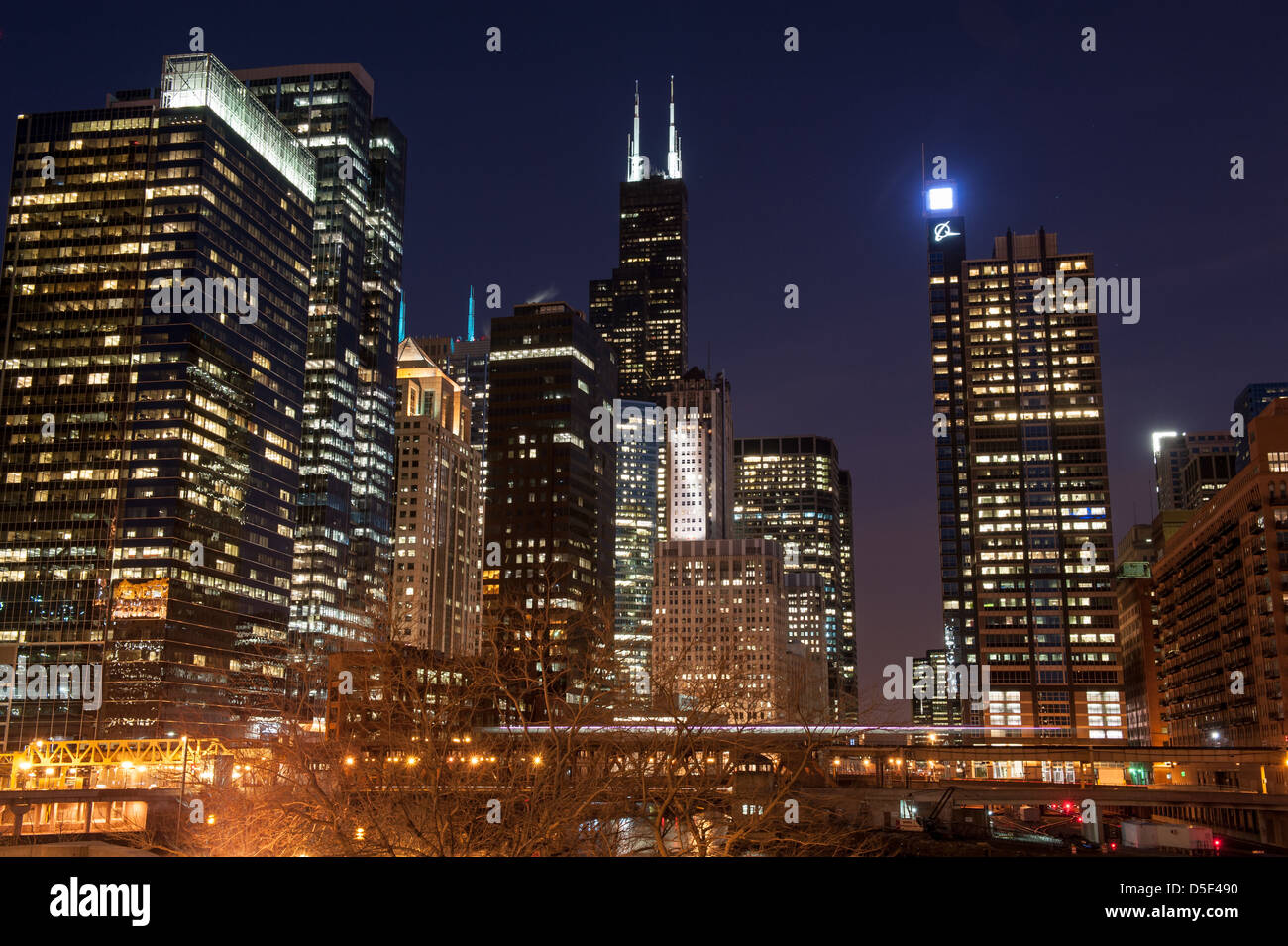 CHICAGO - MARCH 28: A view of the Chicago skyline at night including Willis Tower in Chicago, USA on March 28, 2013. Stock Photo