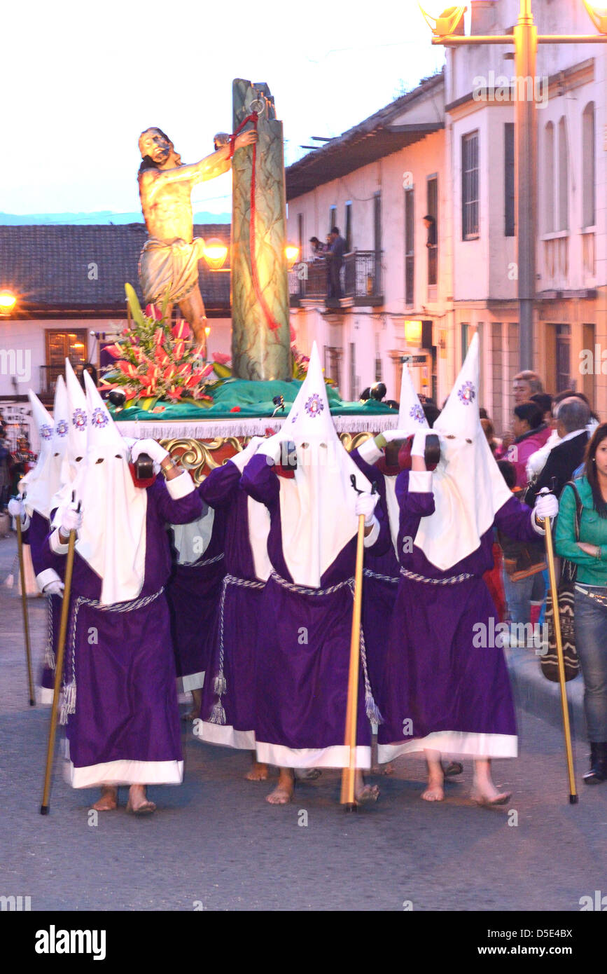 Masked men in Penitence Costume for Easter, an ancient hispanic tradition. Tunja, Boyacá, Andes, Colombia, South America Stock Photo