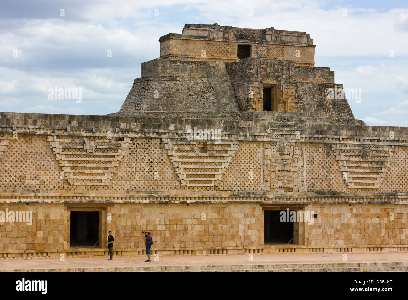 Detail of the eastern building of the Nunnery Quadrangle, with Adivino pyramid showing behind, Uxmal, Yucatan, Mexico Stock Photo