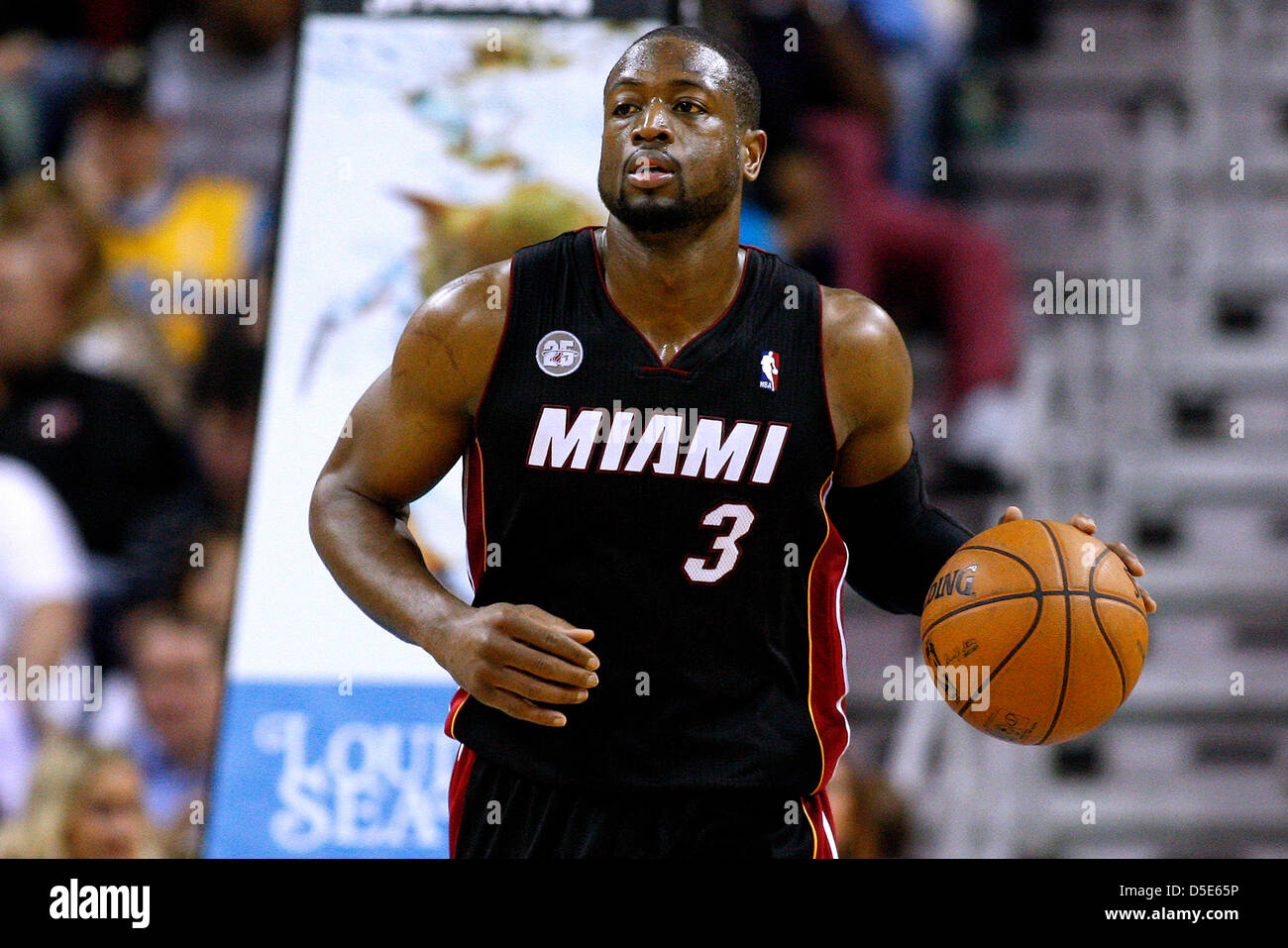 March 29, 2013 - New Orleans, Louisiana, United States of America - March 29, 2013: Miami Heat shooting guard Dwyane Wade (3) drives with the ball during the NBA basketball game between the New Orleans Hornets and the Miami Heat at the New Orleans Arena in New Orleans, LA. Stock Photo