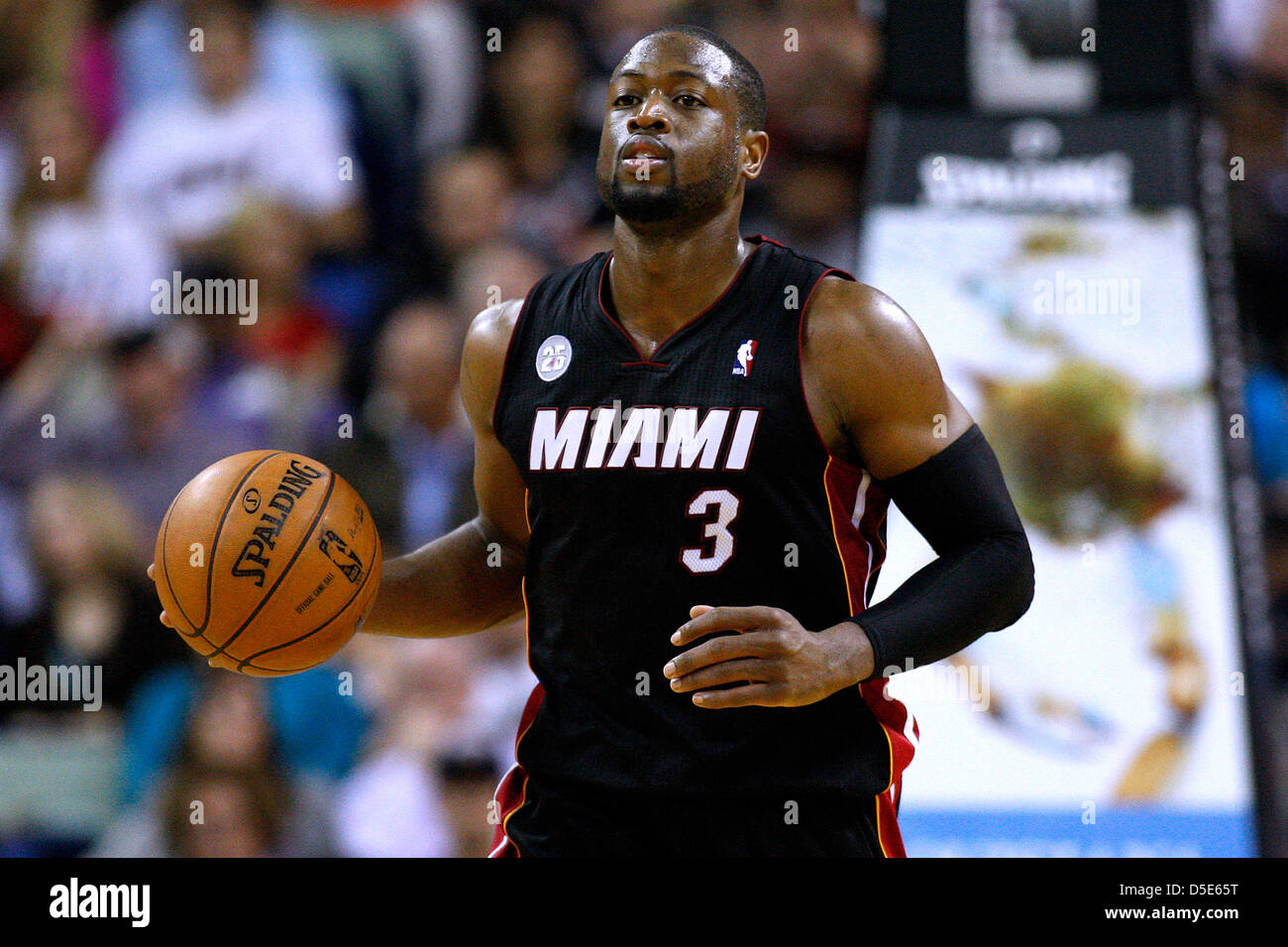 March 29, 2013 - New Orleans, Louisiana, United States of America - March 29, 2013: Miami Heat shooting guard Dwyane Wade (3) drives with the ball during the NBA basketball game between the New Orleans Hornets and the Miami Heat at the New Orleans Arena in New Orleans, LA. Stock Photo