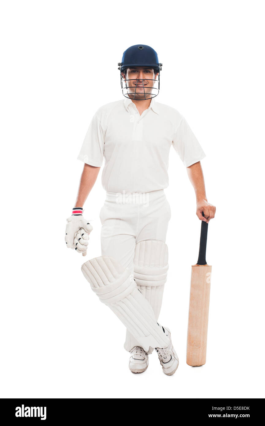Portrait of a batsman standing with a cricket bat Stock Photo Alamy