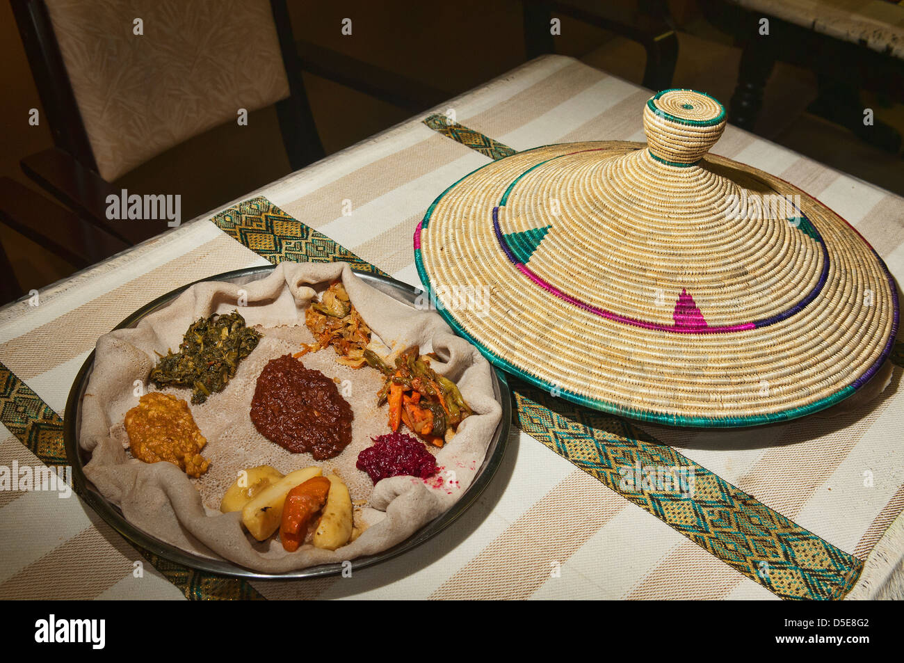 traditional Ethiopian cuisine, injera, and curry Stock Photo