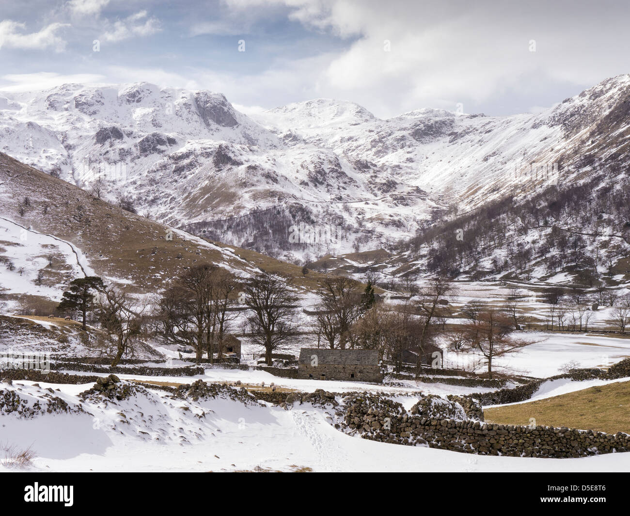 A snowy view of Dovedale and the mountains of the English Lake District in Cumbria in the North West of England Stock Photo