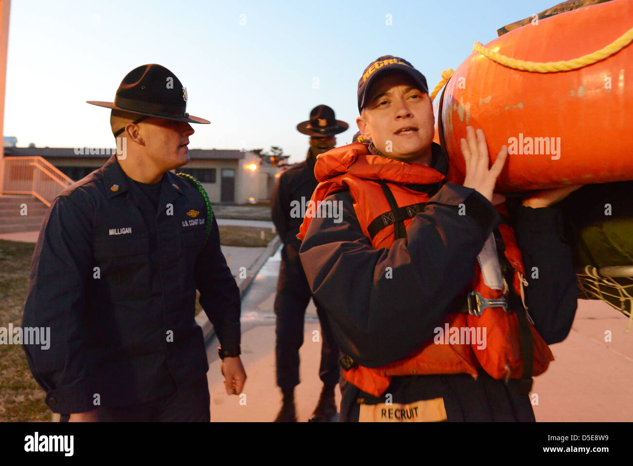 US Coast Guard recruits at Training Center Cape May carry life rafts
