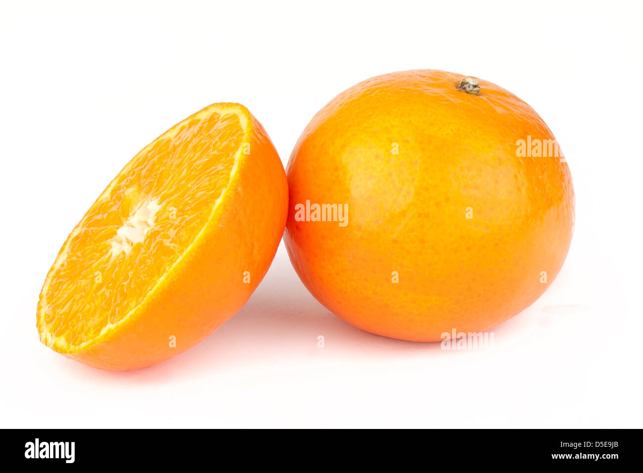 Sliced mandarin fruit isolated on white background Stock Photo - Alamy