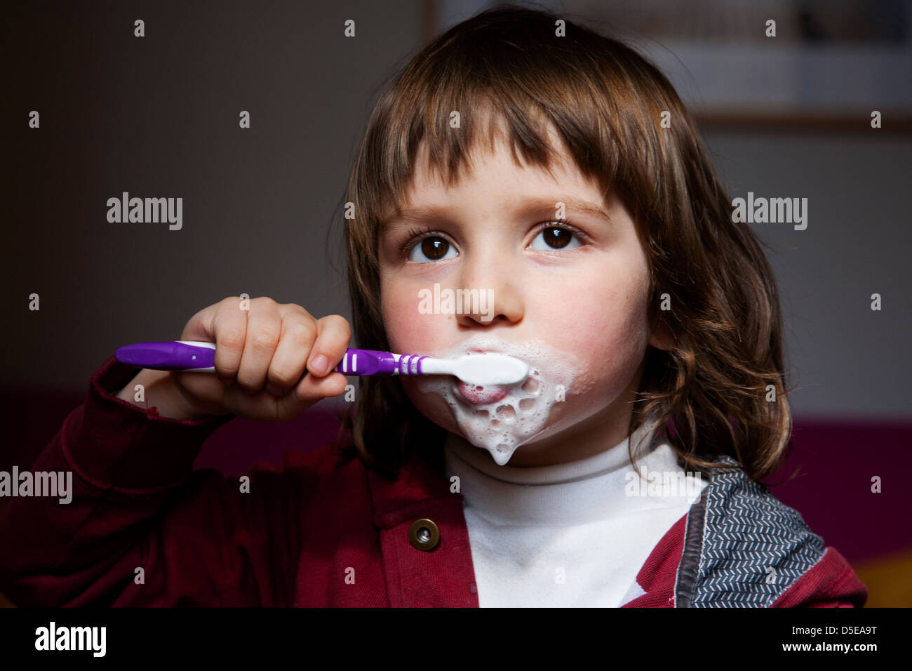 Four year old brushing his teeth Stock Photo - Alamy