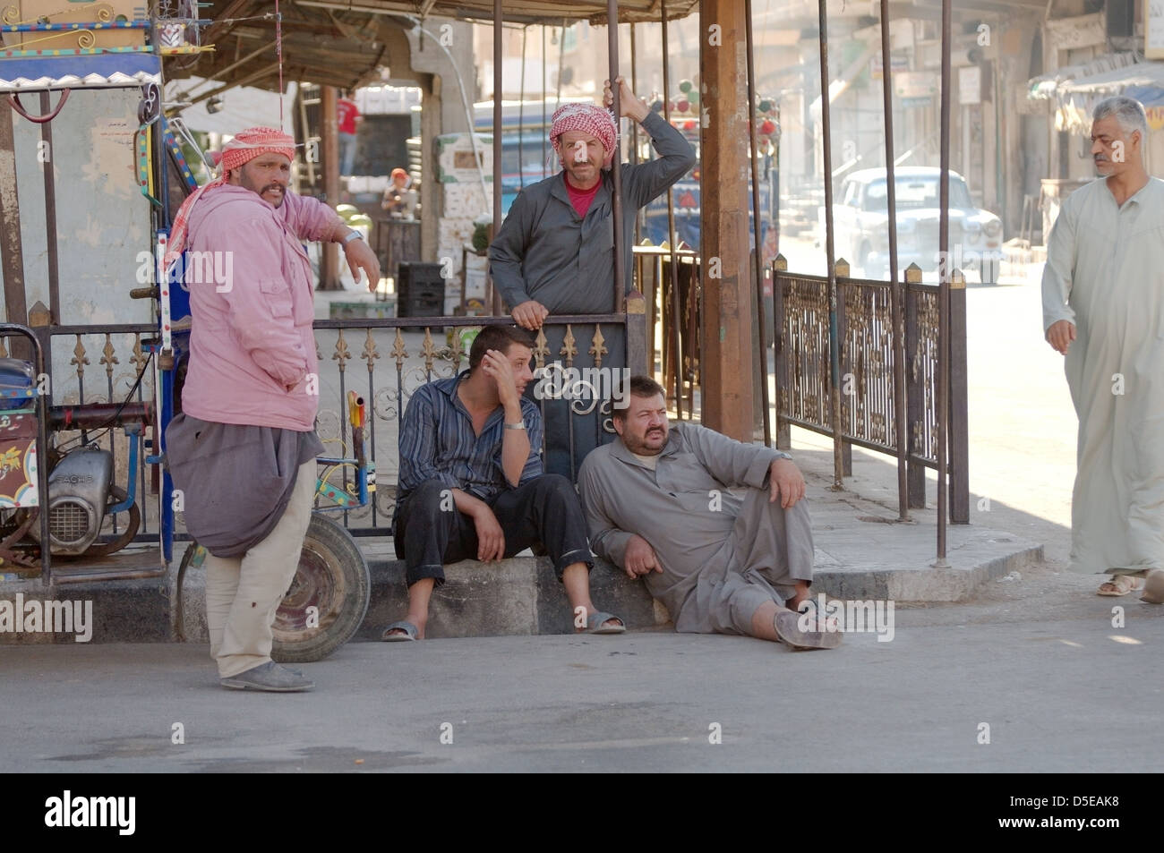 Misters talking in a roadside cafe, Palmyra, Syria  Stock Photo