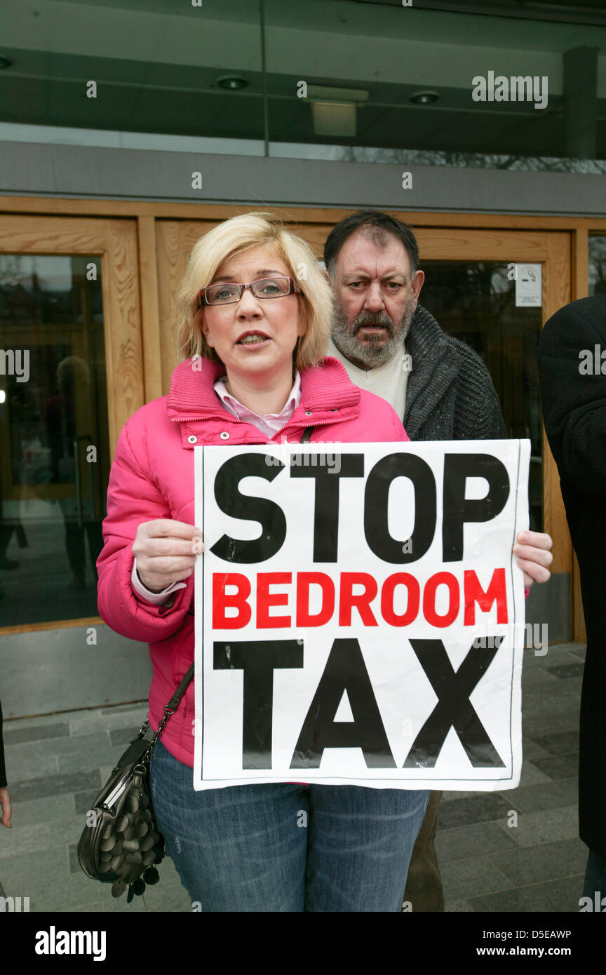 Belfast,Northern Ireland,UK 30th March 2013, Hilary &Owen Rowell  Protesting against the Governments Under Occupation (Bedroom Tax) outside Queen's University Student's Union Stock Photo