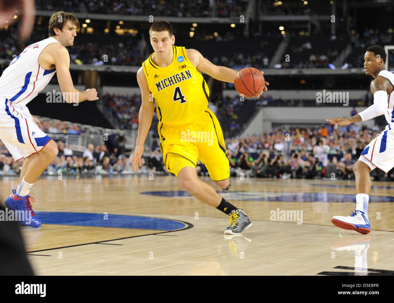 March 29, 2013: Michigan Wolverines forward Mitch McGary #4 scored 25 points during the NCAA Tournament South region between the University of Michigan Wolverines and the University of Kansas Jayhawks at Cowboys Stadium in Arlington, TX Michigan defeated Kansas 87-85 Stock Photo
