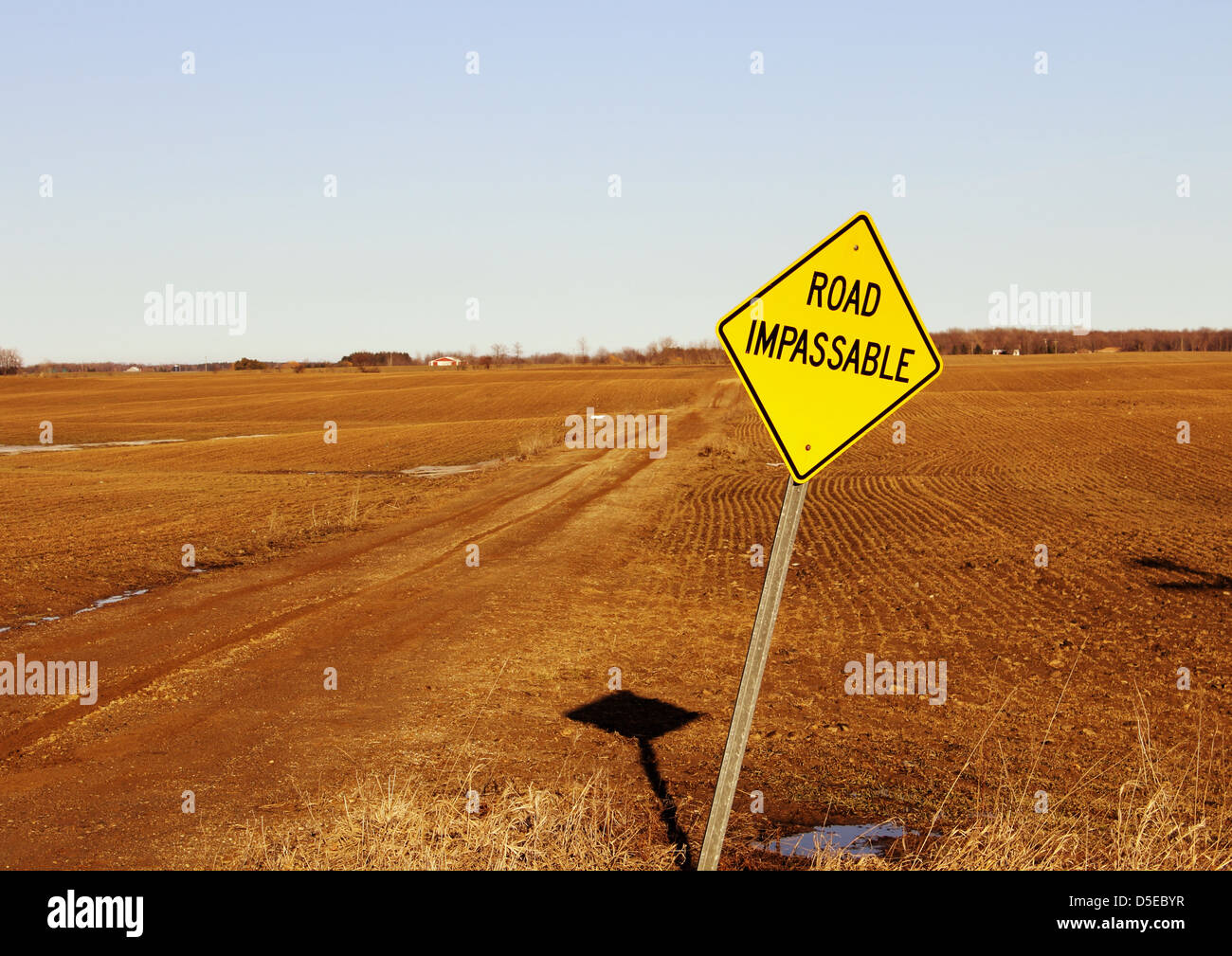 Nothing is impossible! Road impassable sign posted on the corner of a rural country road. Stock Photo