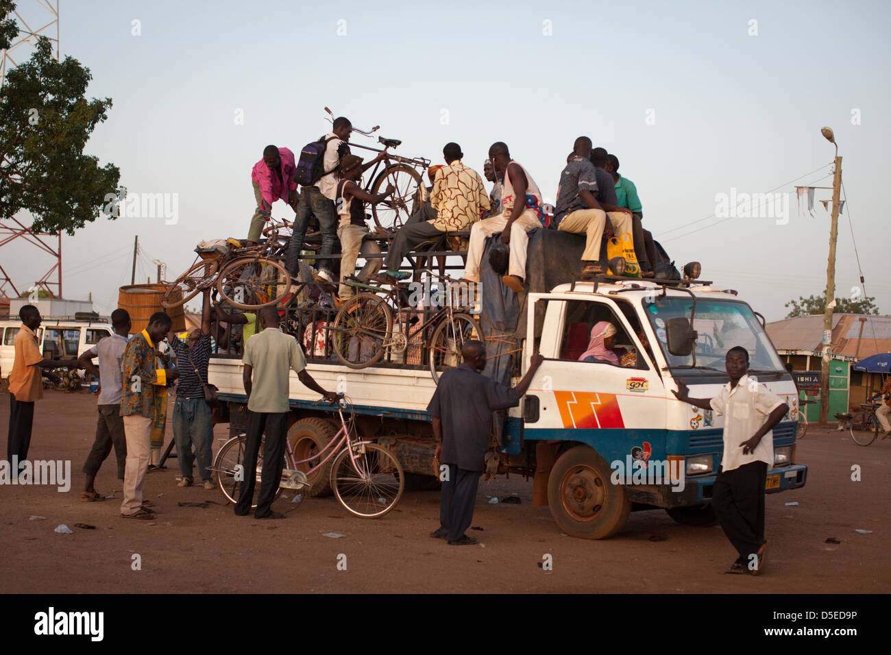 A bus loaded with people prepares to leave Nandom, in northern Ghana, for the journey south. Stock Photo